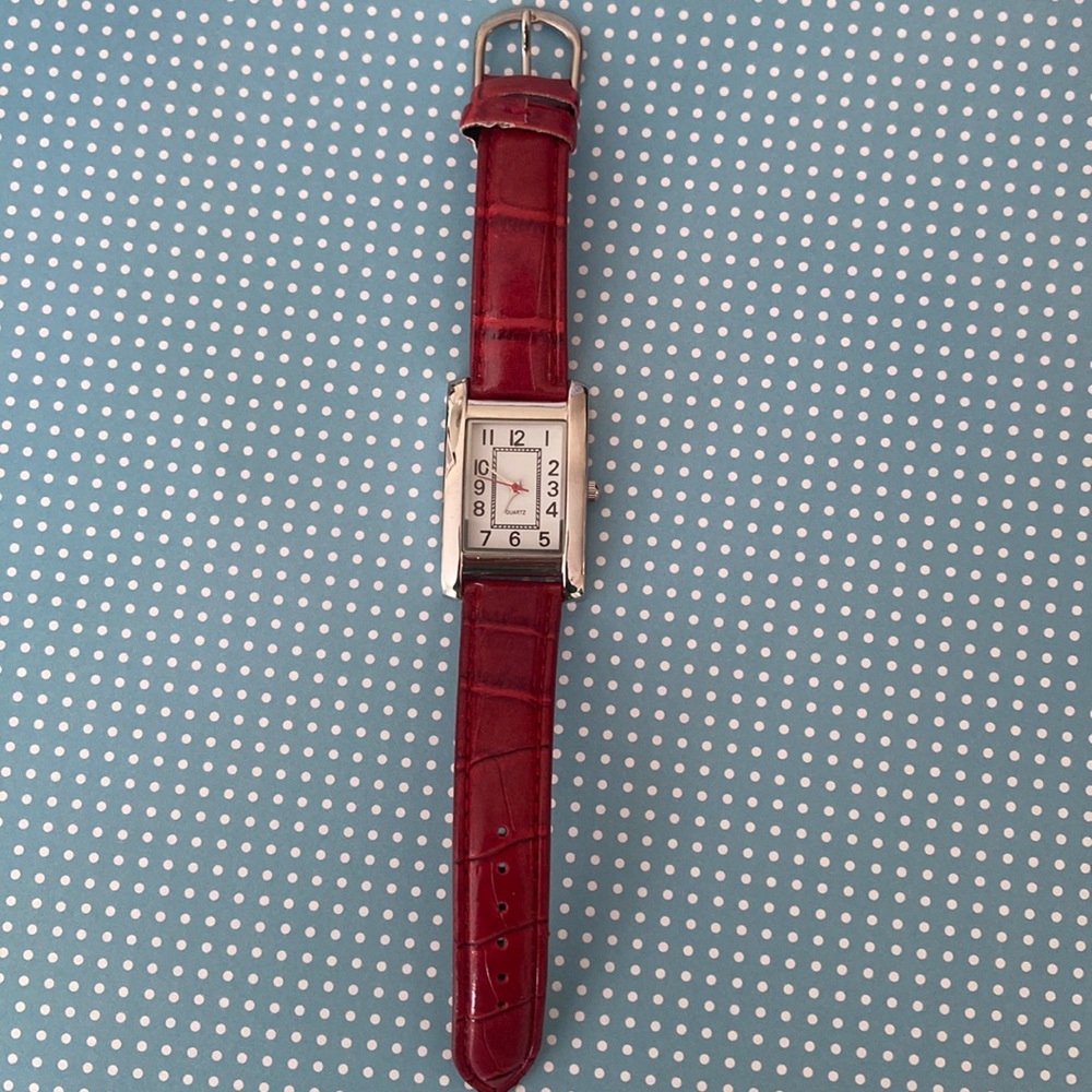 Classic rectangular watch with red strap and red second hand
